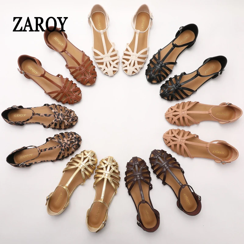 ZAROY صنادل نسائية صيفية أحذية غير رسمية على شكل حرف T صنادل مسطحة بحزام متقاطع منسوجة رومانية مجوفة Sandalia Zapatos sandali