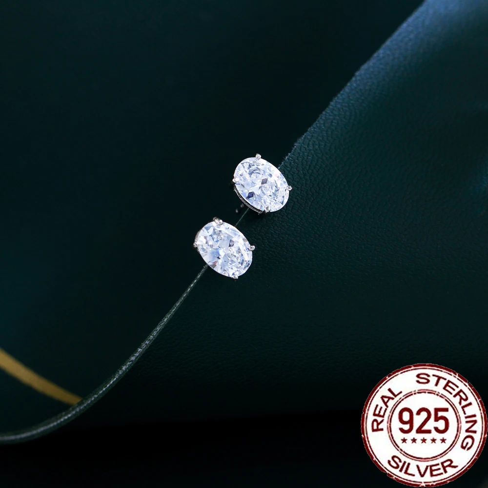 أقراط CWWZircons S925 من الفضة الإسترليني على شكل بيضاوي مرصع بالزركون للنساء والفتيات هدية مجوهرات لحفلات الزفاف SE070