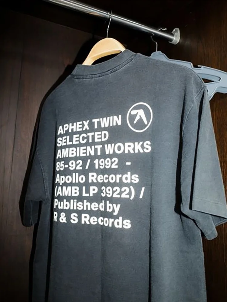 تي شيرت رجالي Aphex Twin مغسول أسود مطبوع قطن جرافيك كبير الحجم موضة كورية بأكمام قصيرة تي شيرت Y2k ملابس الشارع الشهير