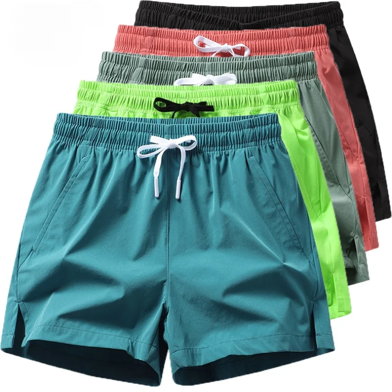 الصالة الرياضية السراويل الرجال Sweatpants جيوب رياضة عارضة السراويل الأساسية خفيفة الوزن السراويل تشغيل الركض شورتات للبحر الرجال ملابس السباحة