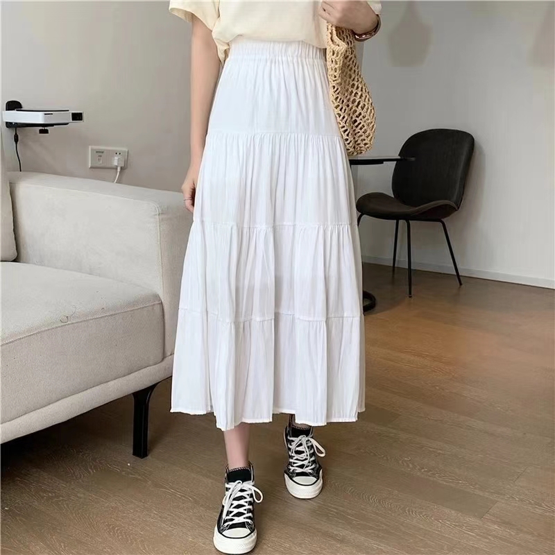 تنورة نسائية طويلة أنيقة بخصر مرتفع ومرن بتصميم كيك أنيق باللونين الأبيض والأسود لموسمي الربيع والصيف